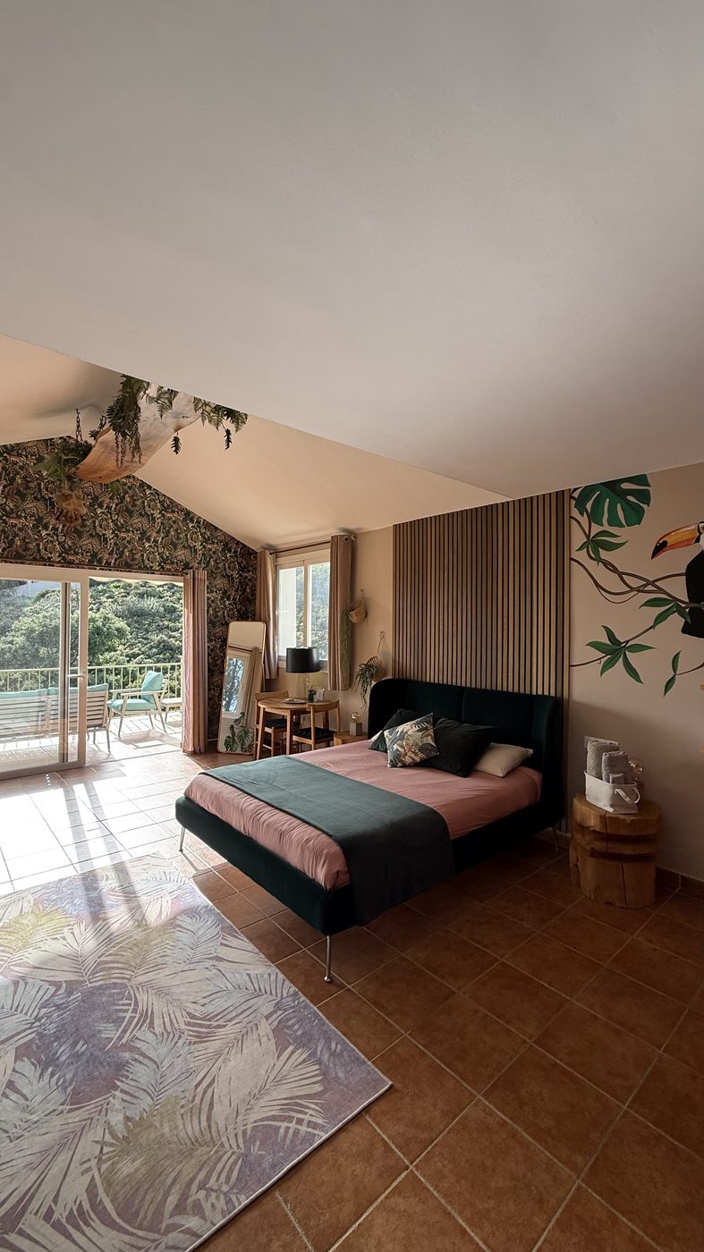 Jungle Joint suite with toucan mural and pool views